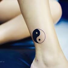 The right side of the yin yang is a fierce dragon and the left side is a beautiful and artistic design. 50 Mysterious Yin Yang Tattoo Designs Cuded