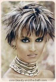 As the name suggests, this involves coloring the top (visible) layer of the hair white and coloring the bottom (less visible) layer black. Black And White Hair Color Black And White Hairstyles Color Gallery Short Hair With Bangs White Hair Color Black White Hair