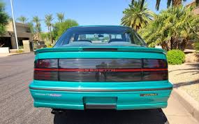 Image result for Bright Turquoise 1990 Colt