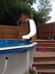 This is my custom homemade 14' water slide going into a 21' above ground pool. Awesome Above Ground Pools Outdoor Inspiration Gallery Poolideas Diy Swimming Pool Swimming Pool Slides Backyard Pool