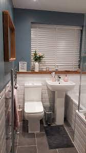 In shower window sill we need a shower window that doesnt have wood. Dreamy Grey Rose Pink And White Small Bathroom With Oak Windowsill Oak Mirror Bathroom Design Small Small Bathroom Bathroom Interior
