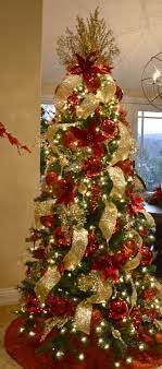 Red And Gold Decorated Christmas Tree Rental Commercial Christmas Decorat Christmas Tree Decorating Themes Red And Gold Christmas Tree Elegant Christmas Trees