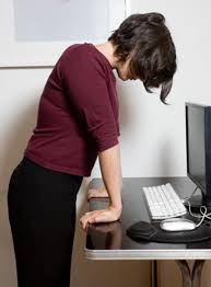 7 Great Yoga Stretches You Can Do At Your Desk Desk Workout Advanced Yoga Desk Yoga