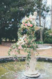 The Most Spectacular Floral Arrangement In The Fountain At Gabbinbar Homestead Flowers By Deanes Wedding F Wedding Arbors Wedding Flowers Ceremony Decorations