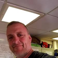 Who can replace windows and provide insulation services for a commercial  building?