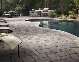 If you choose a sky blue pool water, consider a dark hue like dark granite or bluestone. Poolside Pavers Guide How To Choose The Best Pool Deck Material Install It Direct