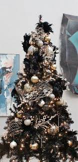 30 sparkling gold and silver christmas decorations. 25 Black Christmas Tree Decor Ideas That Wow Shelterness