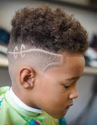 Design a haircut that is just right for a young, hip style. 20 Eye Catching Haircuts For Black Boys