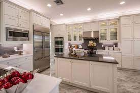 The white kitchen island truly stands out among the dark wooden cabinets and matching dark wood ceiling. Pair Of Base Cabinets Can Be Made Into Kitchen Island Las Vegas Review Journal