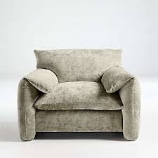 I like the look of the natural material. Living Room Chairs Crate And Barrel