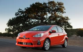 The prius' steering wheel incorporates a. 2013 Toyota Prius C The Surprising Cost Of Thrift The Car Guide