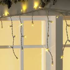 Holiday Time 200 Slow Shimmering Led Icicle Lights Warm White Easy Installation Walmart Com Led Icicle Lights Icicle Lights Lights