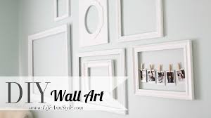 Diy Make A Statement With Empty Picture Frames As Wall Art Lifestyle Wall Frame Design Polaroid Display Chic Wall Art