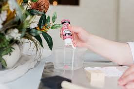 Painters tape (or masking tape…or even washi tape) first, create a house shape on a piece of paper to use as a template, or make one with a scrap piece of wood. Diy Colorful Wood Place Card Holders Tidewater And Tulle Coastal Virginia Wedding Blog And Magazine