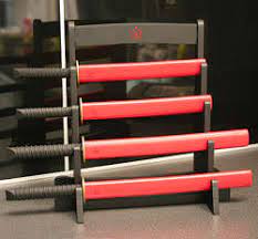 The realistic samurai sword kitchen knives set comes complete with its very own stand. Samurai Warrior Knives Samurai Kitchen Knife Set