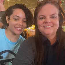 Can a woman as a step step-mom genuinely love another woman's child as her  own