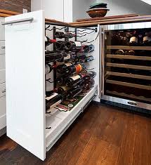 A kitchen island with wine rack (or a kitchen cart with wine rack) provides additional storage as well as another work surface. Store Your Favorite Wines Right In The Kitchen