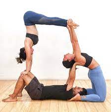 Beginners' balances are an important way to build the core strength necessary for many of yoga's more advanced postures. 3 Person Yoga Challenge Daily Medicos