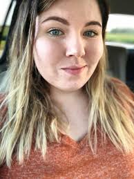 Is circus baby's hair red or orange? I always think it looks orange but I  see people doing cosplays of her with red hair. I wanted to dress as her  for Halloween