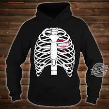 Available in black and lavender, the hoodies have a large skeletal rib cage on the front with a heart and cross as well as a set of crossbones with kill spelled out around them on the back. Lesbian Heart Rib Cage Pride Flag Lgbtq Cool Lgbt Ally Shirt