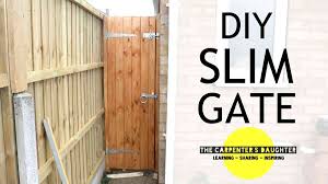 We decided in the planning process that the opening had to be wide enough to accommodate a wheelbarrow going through it (when it comes to hauling plants in and out) and that they would blend almost seamlessly into the fence design. How To Build A Wooden Gate The Carpenter S Daughter