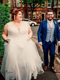 Beautifully Happy Real Plus Size Bride In A Classic Flattering Curvy Wedding Dress With A Flowy Tul Curvy Wedding Dress Plus Size Wedding Gowns Plus Size Bride