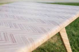 The entire dining table including the legs were created using a single sheet of plywood. Diy Modern Plywood Coffee Table Herringbone Top Oso Diy