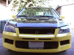 Carbontrix 02 06 Lancer Evo 7 Conversion Front Carbontrix Evo 7 Conversion 999 00 Road Race Motorsports Fiat Mitsubishi And Suzuki Experts I took off the chrome grill surround piece and the chrome window trim pieces. 06 lancer evo 7 conversion front