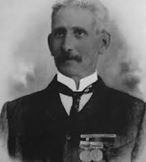 The grave of Private Samuel Pitt. Rorke's Drift defender. His account of  the battle, bible and the gamekeeper's cottage he lived in for a time after  leaving the army.