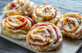 On a lightly floured surface, roll out each pizza crust. Cheesy Pepperoni Pizza Rolls Mum S Pantry