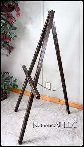 Large wedding easel for welcome sign, display easel stand for paintings and poster board display, 6 color options, natural wood, gold, rose gold, silver, white, black, 65 inches, made in the usa. Floor Easel Large Floor Easel Rustic Wood Easel Wedding Sign Etsy Wood Easel Floor Easel Diy Easel