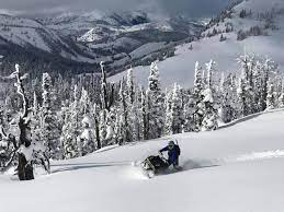 You can rent snowmobiles or take guide tours throughout this winter wonderland. A Winter Snowmobiling Dream Visit Island Park Idaho