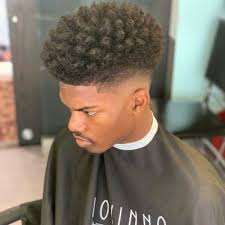 This tapered afro with thick kinky hair on top and goatee results in an edgy modern hairstyle. The 12 Best High Top Fade Black Hairstyles For 2021