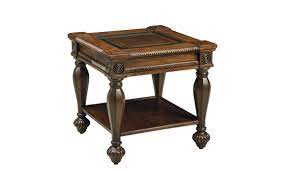 Shapely turned legs leading to elegant bun feet are all the. Sofa Table Ashley Mantera Sofa Table