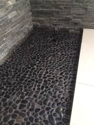 Black Pebble Shower Floor Dark Grout A Slate But Not Quite As Rustic On The Shower Bench And Bath Floor Pebble Shower Floor Stone Shower Floor Shower Floor