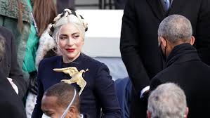 Lady gaga has graced our radios, televisions, and movie screens with her megawatt star presence, and her style definitely lives up to this. Lady Gaga S Inauguration 2021 Outfit Was 100 Extra From Skirt To Brooch