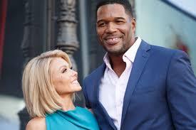 Kelly ripa and mark consuelos couldn't be prouder of eldest child michael as he turned 24 on june kelly ripa shared a sweet photo collage of her and husband mark consuelos to instagram in honor. How Good Morning America Came Between Kelly Ripa And Michael Strahan Explained Vox