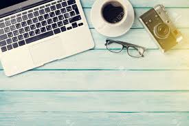 Set of 2 marble c tables $99.99 compare at $130. Desk Table With Laptop Coffee And Camera On Wooden Table With Sun Beam Workplace Top View With Copy Space Stock Photo Picture And Royalty Free Image Image 59668189