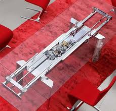 Nomadic Traveler Of Sports Fashion Looking Towards F 16 Design Work And There Is Expandable Dining Table Extendable Dining Table Glass Table