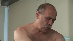 Daddy Luiggi gay porn stroking thick meat