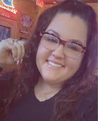 Looping: How Downtown Cruising Became a Symbol of Pride, Not a Problem”  It's a Friday night in Davenport. The sun dips behind the skyline, the  streetlights hum to life, and the lot