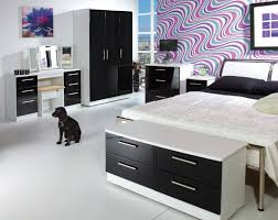 It utilizes a light wall and flooring color to allow the blackness. Knightsbridge Bedroom Range Caprice Bangor Ltd