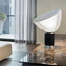 The aluminium reflector is painted gloss white on the outside, matt white on the inside. Flos Taccia Led Table Lamp Small Ambientedirect