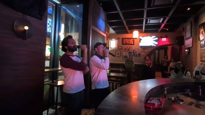 Ed Sheeran sings 'Thinking Out Loud' with fan at Detroit karaoke spot