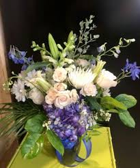 Hours may change under current circumstances Enchanted Blue Floral Arrangement In Monument Co Enchanted Florist