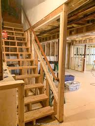 Lay out the stairs by drawing on the outside of the square, sliding the square along until it meets the last mark to learn how to build steps. Why We Opened Up Our Basement Staircase And Installed Iron Balusters Four Generations One Roof