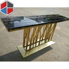 A reception desk is often the first thing clients see upon entering a corporate space. Black Marble Reception Desk In Gold