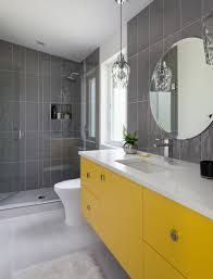 It can be a floor clad with matching tiles, a vanity, a sink or a bathtub, some textiles and other accessories that are smaller but will still have an impact with their color. 25 Cheerful Grey And Yellow Bathrooms Shelterness