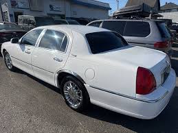 Image result for Light Ice Blue 2010 Town Car