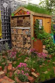 The Evolution Of Capel Manor College Garden Not Just A Bug Hotel A Real Bug Ritz Wildlife Gardening Patio Garden Design Bug Hotel